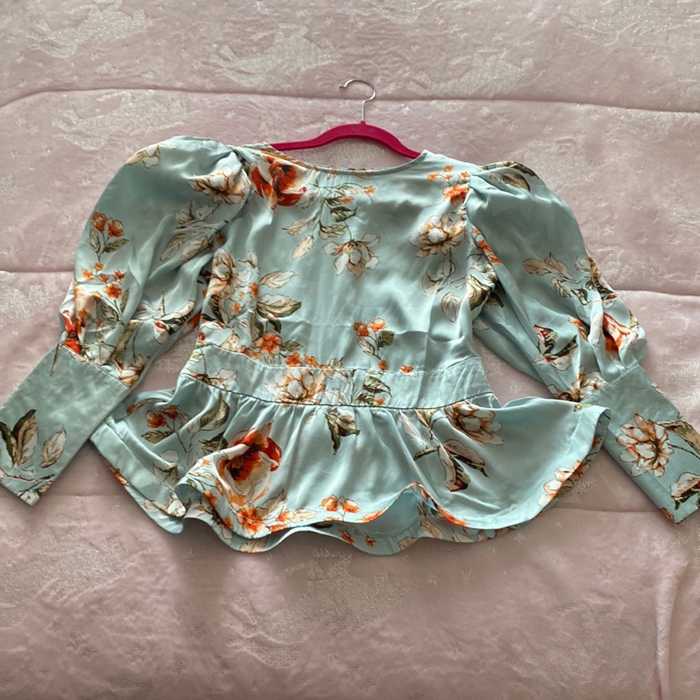 Fashion nova floral blouse in size medium